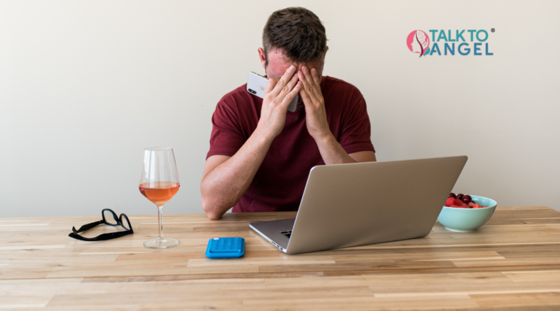 Overwhelmed person managing stress with online therapy support