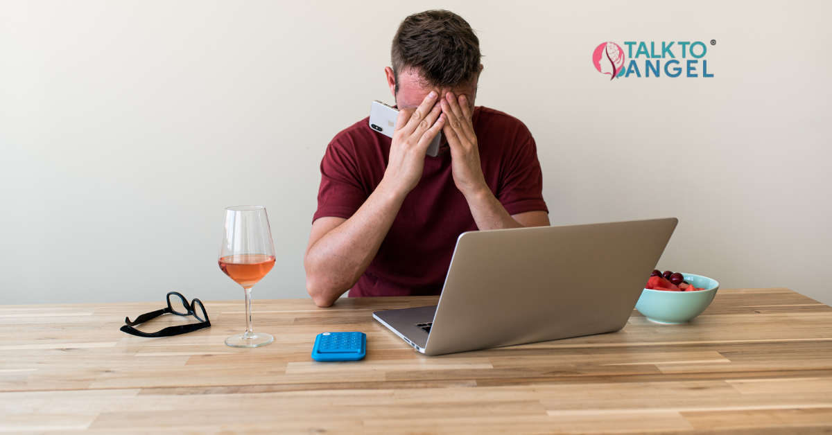 Overwhelmed person managing stress with online therapy support