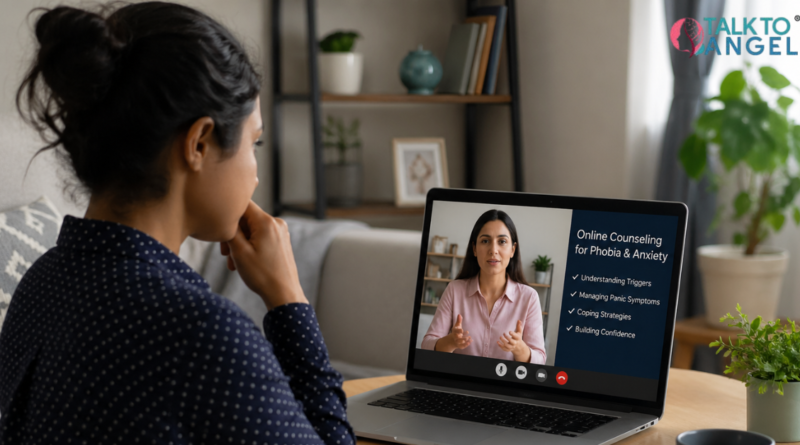 Person sitting at home using a laptop for online counselling to manage phobia anxiety