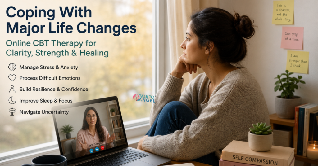 Person sitting thoughtfully by a window during a major life transition, receiving online CBT therapy support on a laptop.