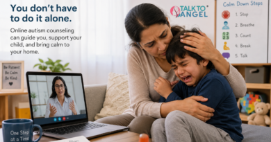 Mother comforting her child during an autism emotional meltdown at home while attending an online counselling session.