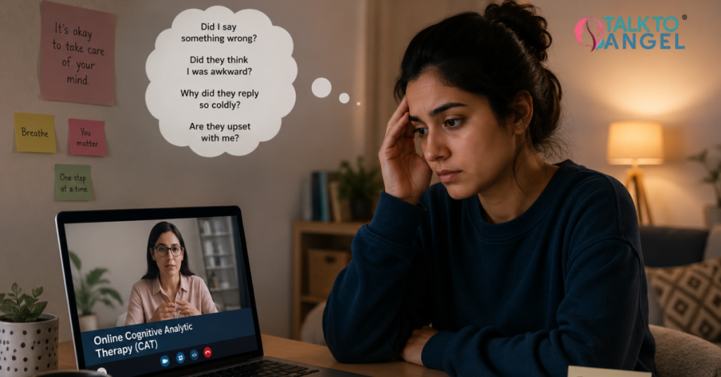 Young woman sitting alone at home, overthinking a recent conversation while attending an online CAT Therapy session on her laptop.