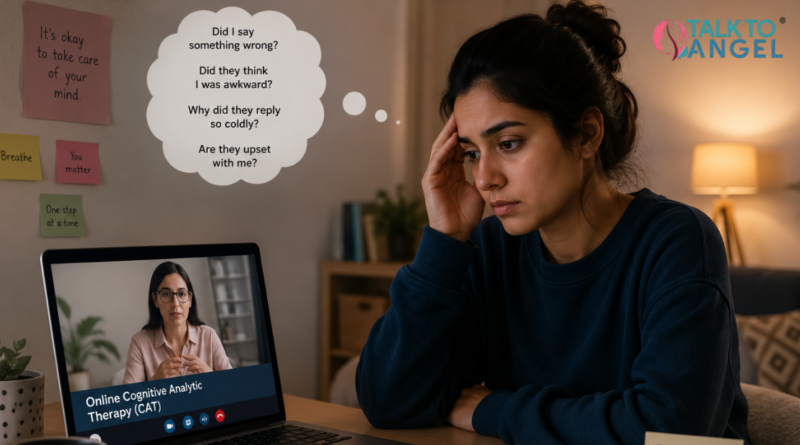 Young woman sitting alone at home, overthinking a recent conversation while attending an online CAT Therapy session on her laptop.