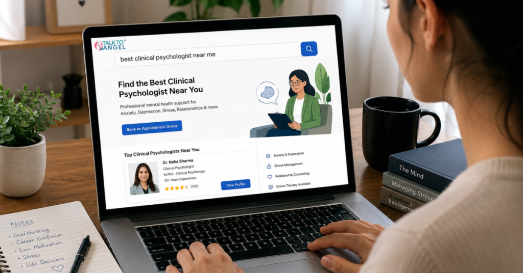Individual using a laptop to search for the best clinical psychologist near me for access professional mental health support online.
