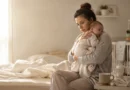 Exhausted new mother coping with postpartum depression and fatigue at home