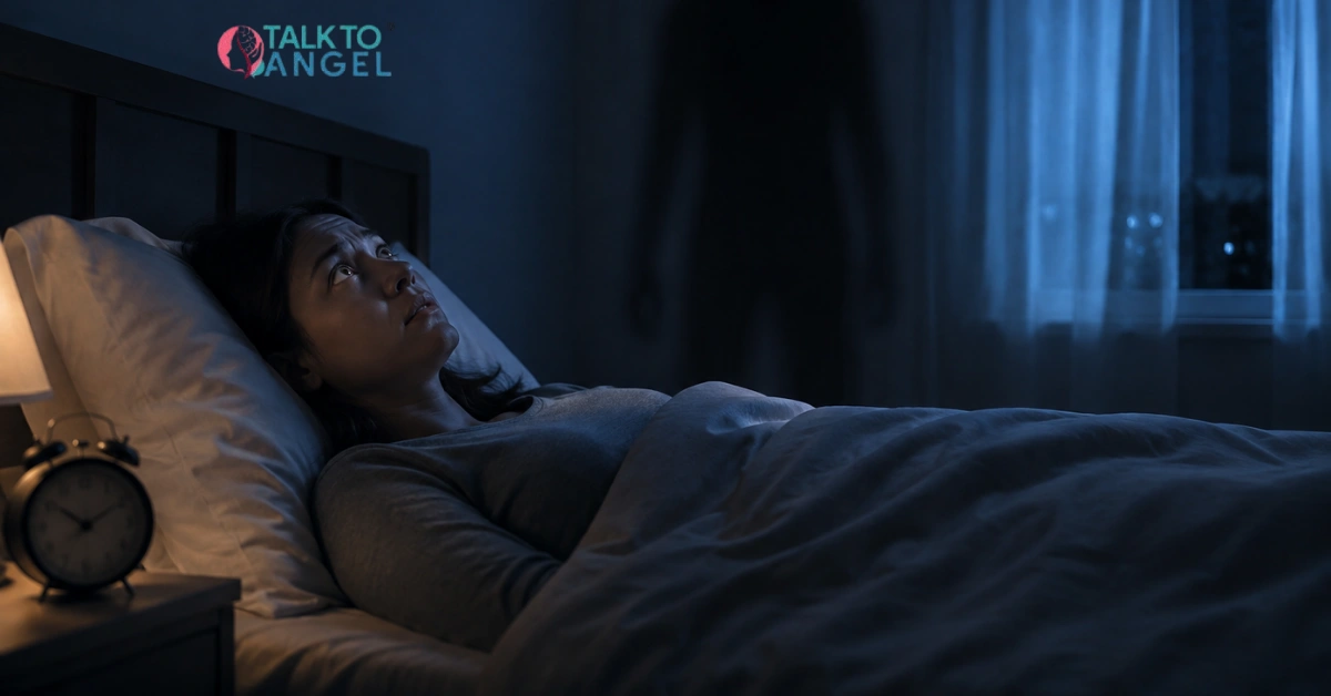 Person experiencing sleep paralysis while lying awake in bed at night