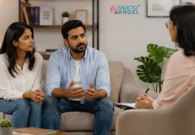Couple discussing relationship concerns with a couples counselor during a supportive couples therapy session.