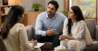 Couple discussing in-law conflicts with a Delhi marriage counsellor during a supportive therapy session.