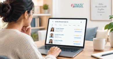Woman searching for an anxiety therapist near her on a laptop at home